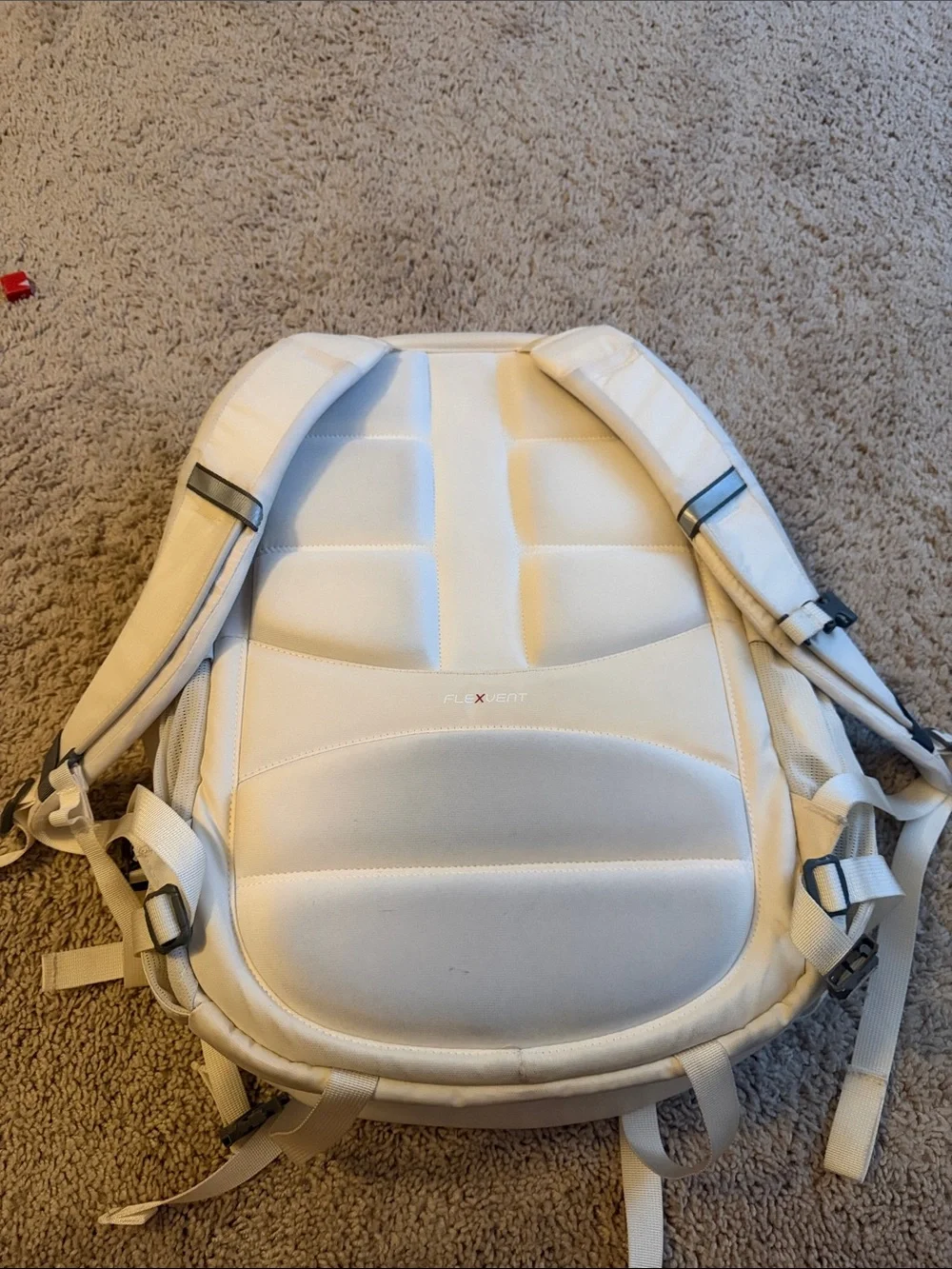 The North Face Surge Lux Backpack in Cream with Rose Gold(good as new 90%)